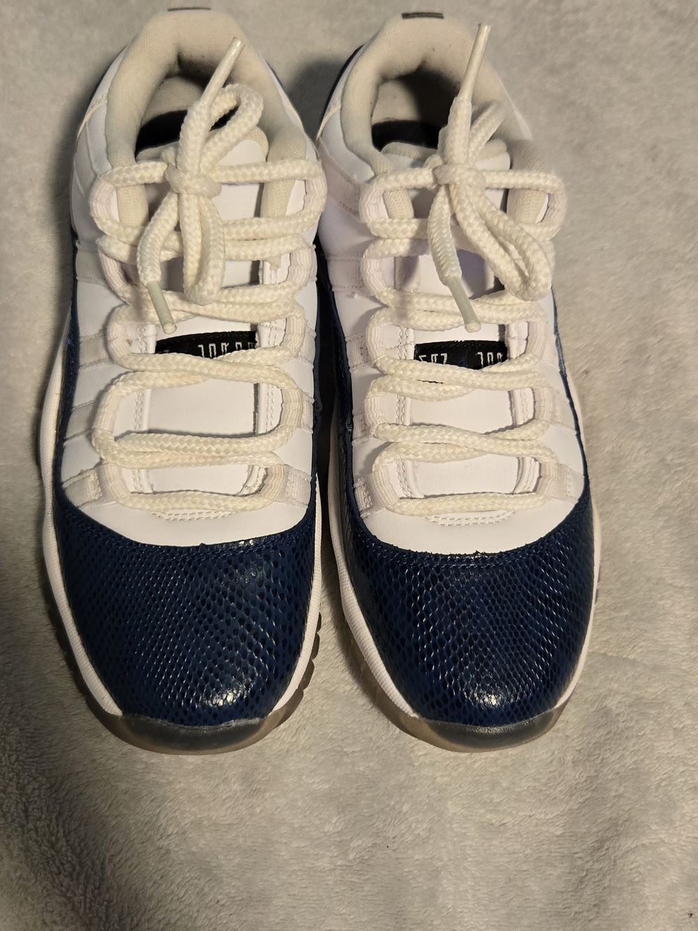 Jordan 11 White and Navy Low-Top Sneakers